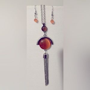Orange drop silver tone metal necklace.